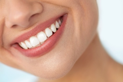 Closeup Of Beautiful Smile With White Teeth. Woman Mouth Smiling. High Resolution Image