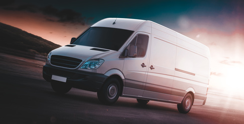 White van for freight haulage on a freeway
