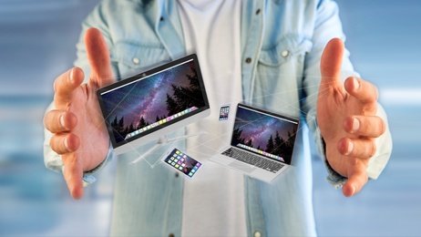 Devices like smartphone, tablet or computer flying over connection network - 3d render