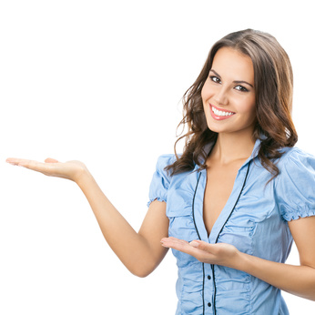 Beautiful young woman showing blank signboard